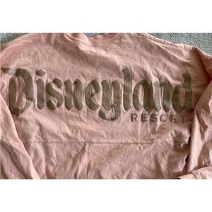 (Sold) Peach / rose gold Disneyland Spirit Jersey sz L